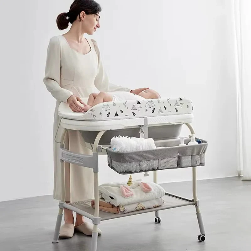 Foldable Baby Changing Table with Adjustable Height & Built-In Bath - Image 9