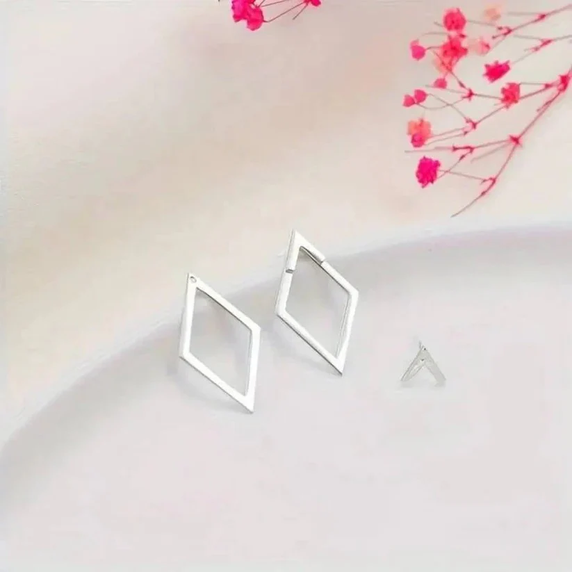 Geometric Diamond and Arrow Drop Earrings in Gold and Silver - Image 4